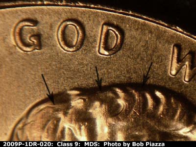 Die-stage B marker on 2009P•1DR•020 (2009 Doubled Die Reverse).
