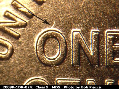 Die-stage B marker on 2009P•1DR•024 (2009 Doubled Die Reverse).