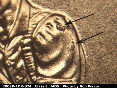 Die-stage B marker on 2009P•1DR•024 (2009 Doubled Die Reverse).