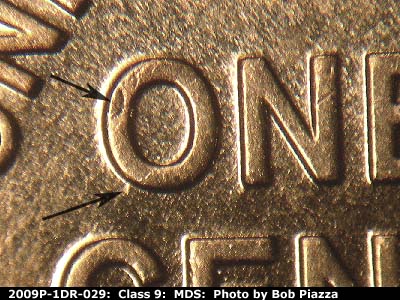 Die-stage B marker on 2009P•1DR•029 (2009 Doubled Die Reverse).