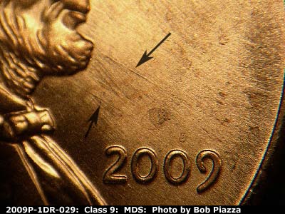 Die-stage B marker on 2009P•1DR•029 (2009 Doubled Die Reverse).