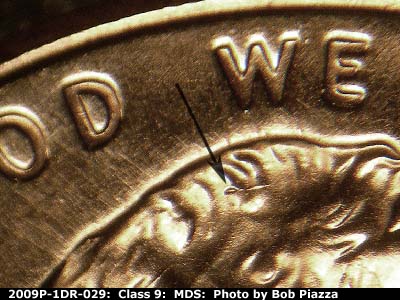 Die-stage B marker on 2009P•1DR•029 (2009 Doubled Die Reverse).