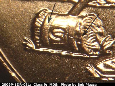 Die-stage B marker on 2009P•1DR•031 (2009 Doubled Die Reverse).