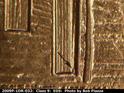 Die-stage A marker on 2009P•1DR•032 (2009 Doubled Die Reverse).