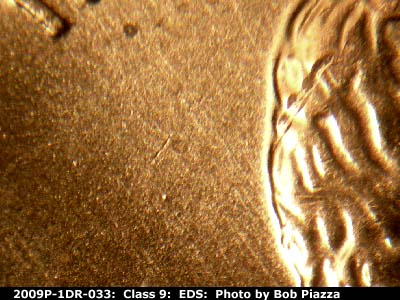 Die-stage A marker on 2009P•1DR•033 (2009 Doubled Die Reverse).