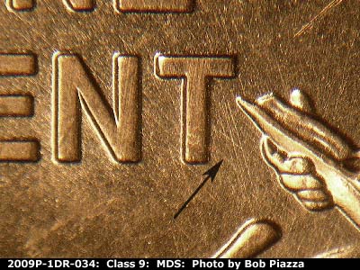 Die-stage B marker on 2009P•1DR•034 (2009 Doubled Die Reverse).