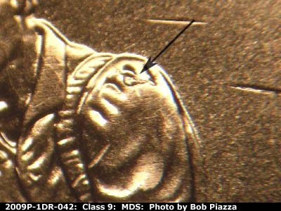 Die-stage B marker on 2009P•1DR•042 (2009 Doubled Die Reverse).