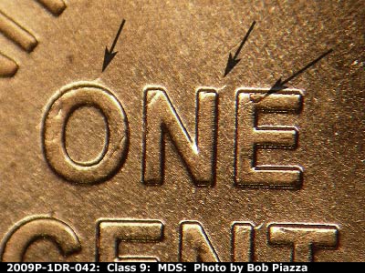 Die-stage B marker on 2009P•1DR•042 (2009 Doubled Die Reverse).