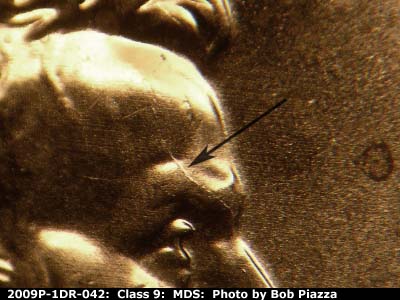 Die-stage B marker on 2009P•1DR•042 (2009 Doubled Die Reverse).