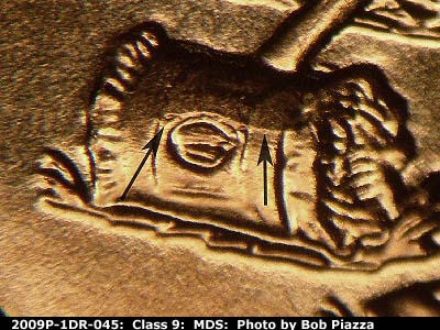 Die-stage B marker on 2009P•1DR•045 (2009 Doubled Die Reverse).