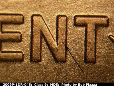 Die-stage B marker on 2009P•1DR•045 (2009 Doubled Die Reverse).