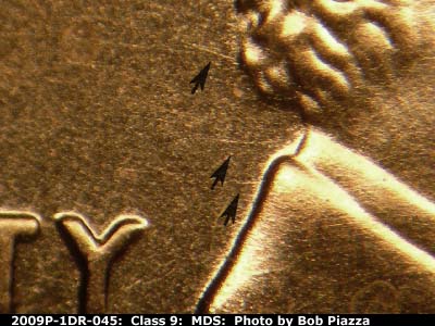Die-stage B marker on 2009P•1DR•045 (2009 Doubled Die Reverse).