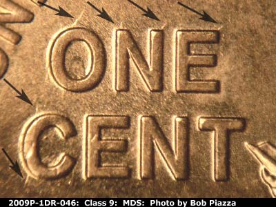Die-stage B marker on 2009P•1DR•046 (2009 Doubled Die Reverse).