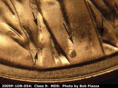 Die-stage B marker on 2009P•1DR•054 (2009 Doubled Die Reverse).