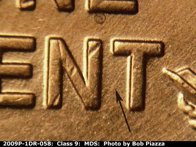 Die-stage B marker on 2009P•1DR•058 (2009 Doubled Die Reverse).
