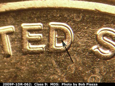 Die-stage B marker on 2009P•1DR•062 (2009 Doubled Die Reverse).