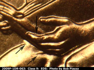 Die-stage A marker on 2009P•1DR•063 (2009 Doubled Die Reverse).