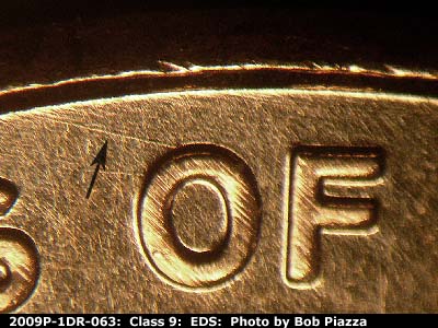 Die-stage A marker on 2009P•1DR•063 (2009 Doubled Die Reverse).