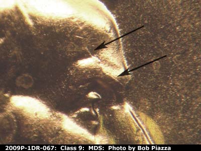 Die-stage B marker on 2009P•1DR•067 (2009 Doubled Die Reverse).
