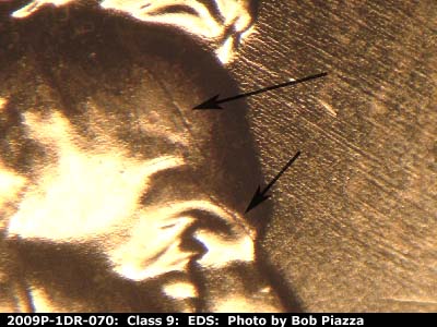 Die-stage A marker on 2009P•1DR•070 (2009 Doubled Die Reverse).