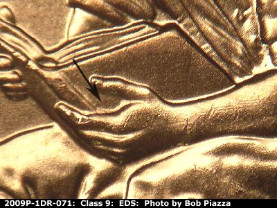 Die-stage A marker on 2009P•1DR•071 (2009 Doubled Die Reverse).