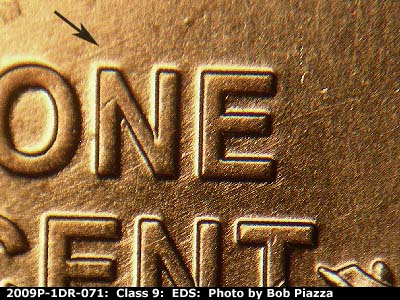 Die-stage A marker on 2009P•1DR•071 (2009 Doubled Die Reverse).