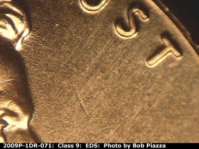 Die-stage A marker on 2009P•1DR•071 (2009 Doubled Die Reverse).