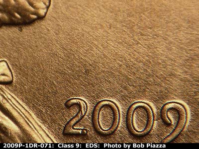 Die-stage A marker on 2009P•1DR•071 (2009 Doubled Die Reverse).