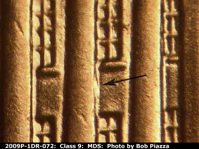 Die-stage B marker on 2009P•1DR•072 (2009 Doubled Die Reverse).