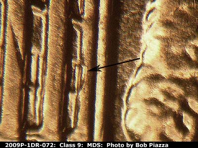 Die-stage B marker on 2009P•1DR•072 (2009 Doubled Die Reverse).