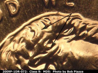 Die-stage B marker on 2009P•1DR•072 (2009 Doubled Die Reverse).