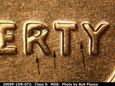 Die-stage B marker on 2009P•1DR•072 (2009 Doubled Die Reverse).