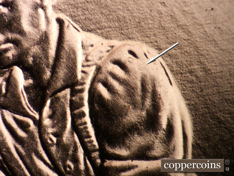 Die-stage A marker on 2009P•1DR•073 (2009 Doubled Die Reverse).