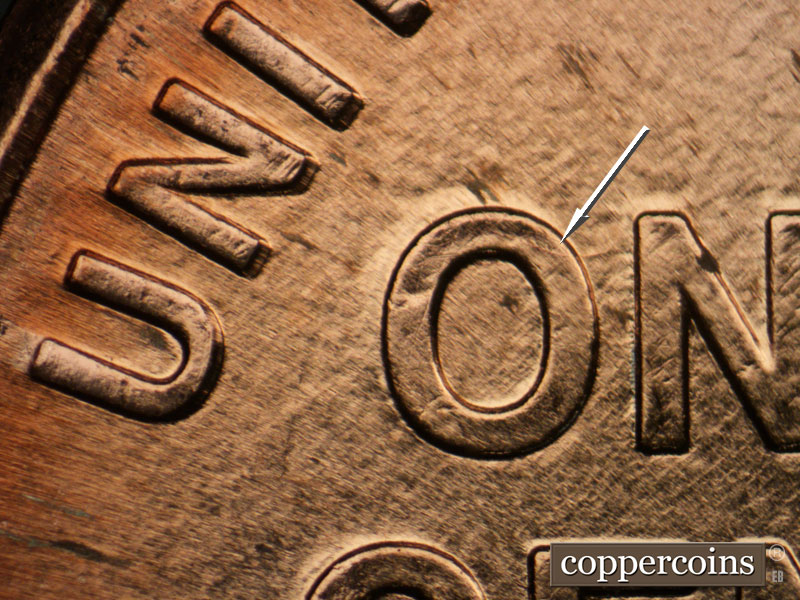 Die-stage B marker on 2009P•1DR•074 (2009 Doubled Die Reverse).