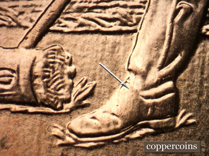 Die-stage B marker on 2009P•1DR•074 (2009 Doubled Die Reverse).