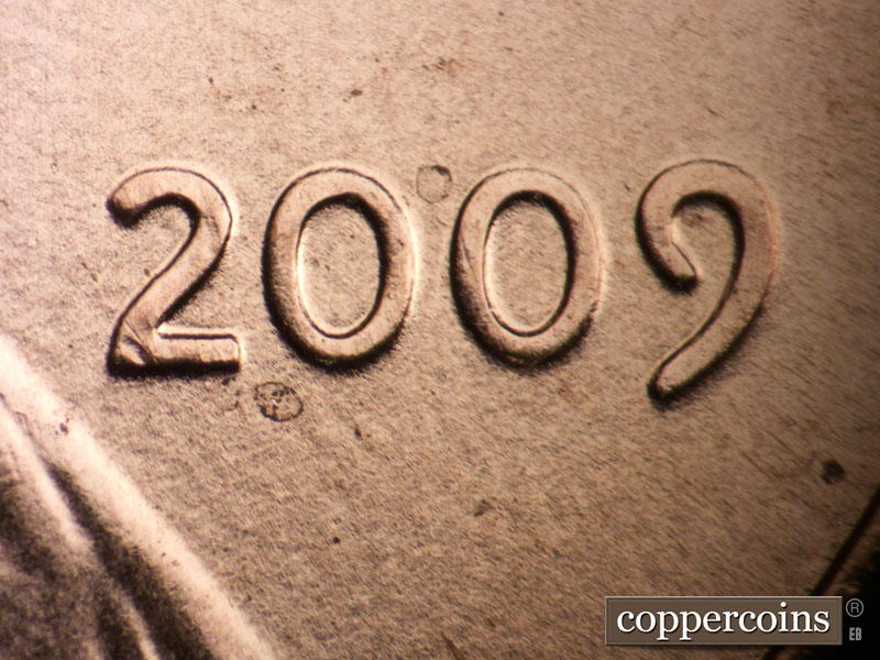 Die-stage A marker on 2009P•1DR•075 (2009 Doubled Die Reverse).