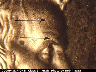 Die-stage B marker on 2009P•1DR•078 (2009 Doubled Die Reverse).