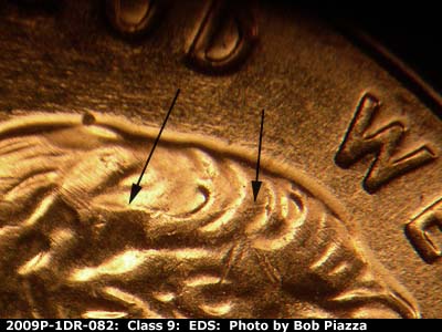 Die-stage A marker on 2009P•1DR•082 (2009 Doubled Die Reverse).