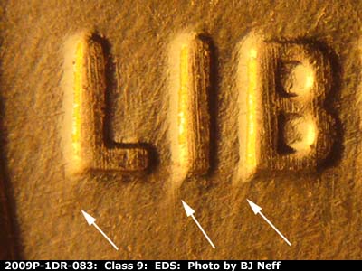 Die-stage A marker on 2009P•1DR•083 (2009 Doubled Die Reverse).