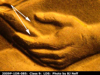 Die-stage C marker on 2009P•1DR•085 (2009 Doubled Die Reverse).