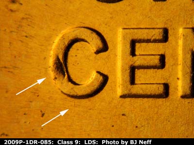 Die-stage C marker on 2009P•1DR•085 (2009 Doubled Die Reverse).