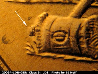 Die-stage C marker on 2009P•1DR•085 (2009 Doubled Die Reverse).