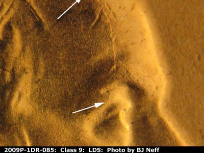Die-stage C marker on 2009P•1DR•085 (2009 Doubled Die Reverse).