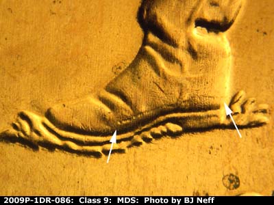 Die-stage B marker on 2009P•1DR•086 (2009 Doubled Die Reverse).