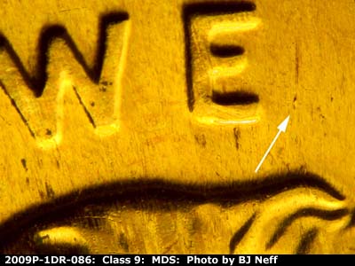 Die-stage B marker on 2009P•1DR•086 (2009 Doubled Die Reverse).