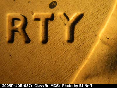 Die-stage B marker on 2009P•1DR•087 (2009 Doubled Die Reverse).