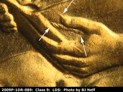 Die-stage C marker on 2009P•1DR•089 (2009 Doubled Die Reverse).