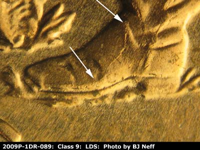 Die-stage C marker on 2009P•1DR•089 (2009 Doubled Die Reverse).