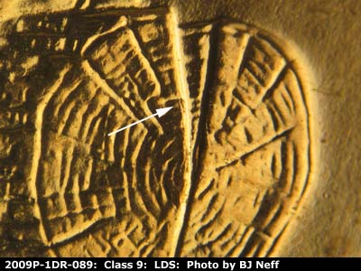Die-stage C marker on 2009P•1DR•089 (2009 Doubled Die Reverse).