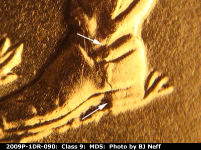 Die-stage B marker on 2009P•1DR•090 (2009 Doubled Die Reverse).
